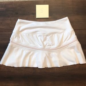 Nike White ruffle skirt with gold detail
